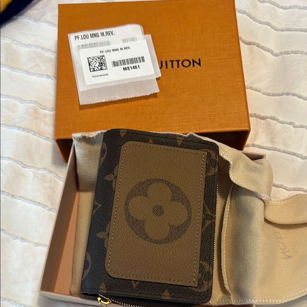Louis Vuitton Lou reverse monogram wallet with tags and box